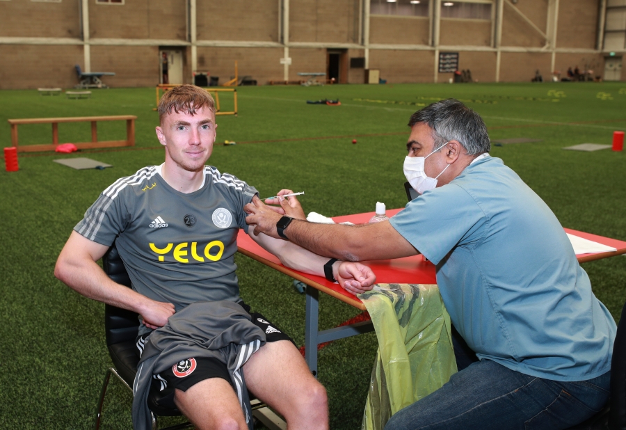 SUFC midfielder Ben Osborn having the vaccination.JPG